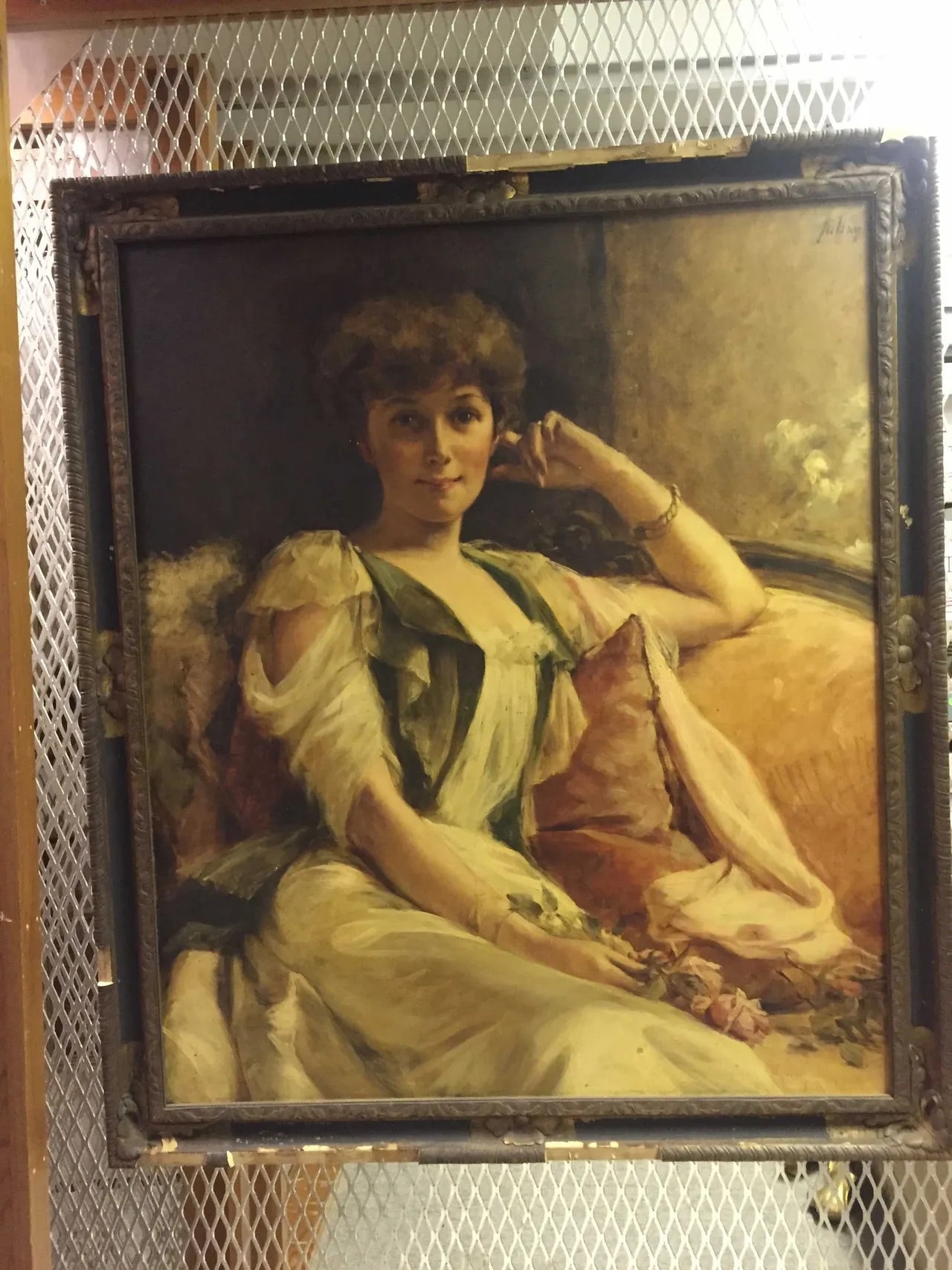The full oil portrait of Alice Snell by Julian Russell Story, photographed in the Florence Griswold Museum storage room